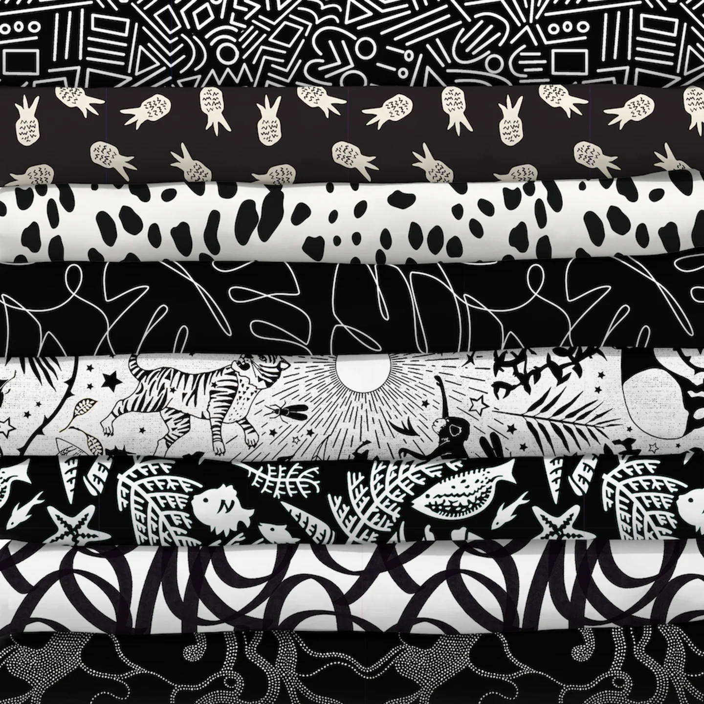 Stack of black and white fabrics