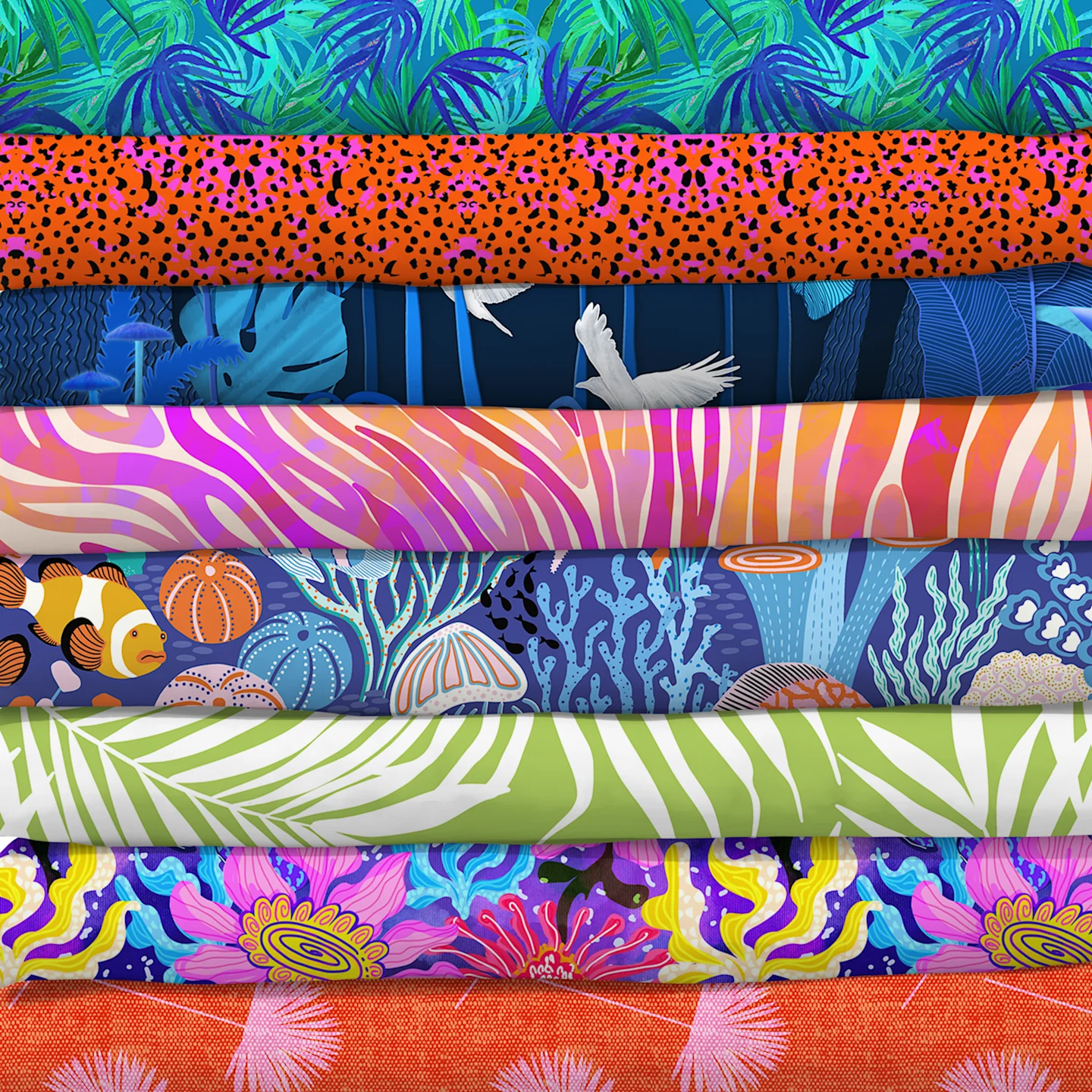Stack of bright tropical fabrics