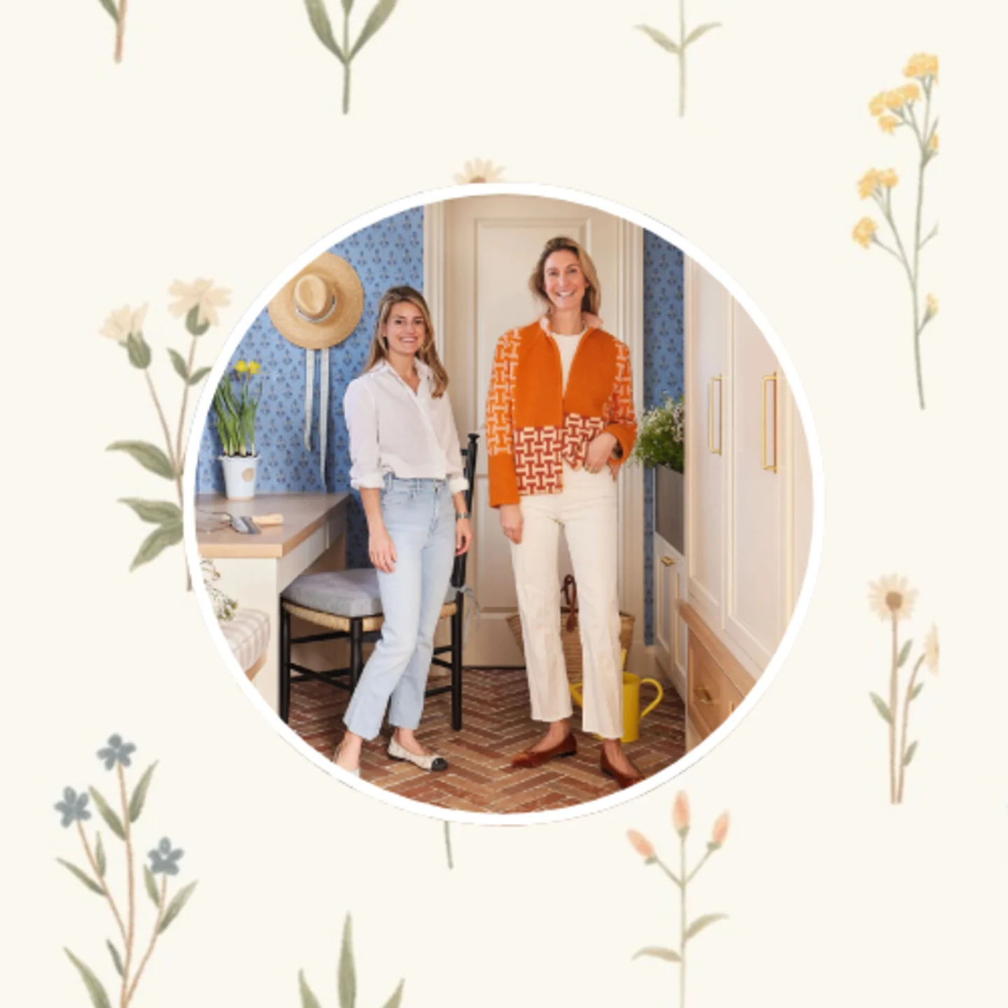 Molly Young and Jess Bauer of By Interiors in front of a small floral design on a neutral background.